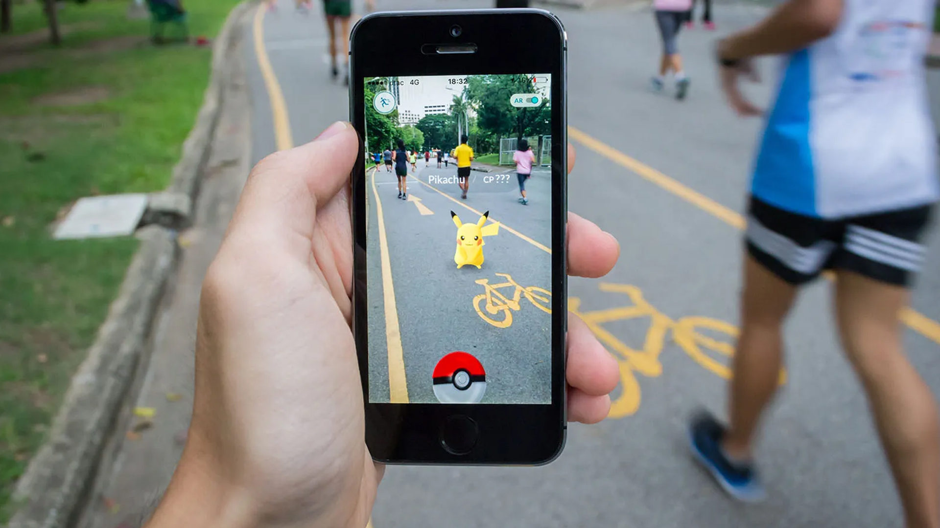 Pokémon Go gameplay with Pikachu appearing in an urban AR environment, demonstrating real-world interaction and addictive digital experiences through mobile gaming.